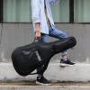 imageDonner 36 Inch Acoustic Guitar Case 04 Inch Thick Padding Sponge 600D Ripstop Waterproof Nylon Soft Guitar Gig Bag with 3 Pockets and Back Hanger Loop Black36 inch10mm Thick