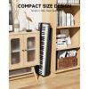 imageDonner DK10S Light up Piano Keyboard for Beginners Portable 61 Key Electronic Keyboard with 5H Battery Life 300 Rhythms 500 Tones Learning Mode Bundle with Wooden Piano Stand POP APP Black